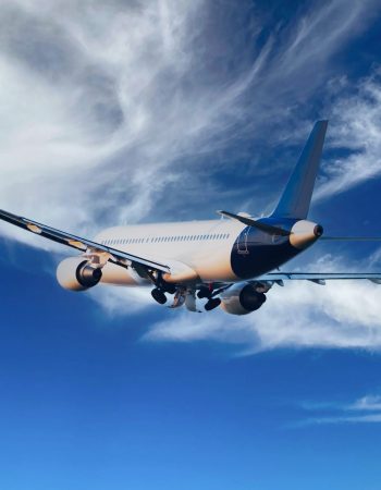 Passengers Commercial airplane flying above dramatic clouds. Concept of fast travel, holidays and business. Commercial transportation concept